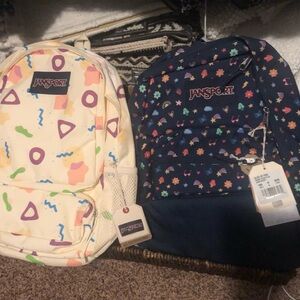 JanSport Navy Backpack with Multicolored Floral Design